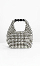 Сумочка, изготовленная путем переплетения серебряных бусин. Модель с одной короткой ручкой и черным бантом в комплекте. Высота изделия составляет 12 см, длина ручки - 13 см.
