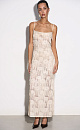 Платье длины макси с геометрическим орнаментом и бахромой, выполненными пайетками. Модель на тонких бретелях, без застежки. Изделие выполнено без подкладки.