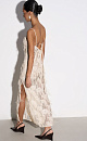 Платье длины макси с геометрическим орнаментом и бахромой, выполненными пайетками. Модель на тонких бретелях, без застежки. Изделие выполнено без подкладки.