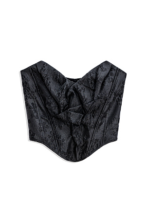 черный Корсет из жатого жаккарда с растительным орнаментом. Модель без бретелей, с фигурным вырезом декольте, драпировкой и объемным декором. Шнуровка на спинке через металлические люверсы.