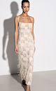 Платье длины макси с геометрическим орнаментом и бахромой, выполненными пайетками. Модель на тонких бретелях, без застежки. Изделие выполнено без подкладки.