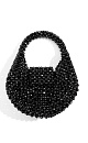 Сумочка полукруглой формы, выполненная путем переплетения ограненных бусин одинакового диаметра. Модель с одной короткой ручкой. Высота изделия составляет 18 см, длина ручки - 12 см.