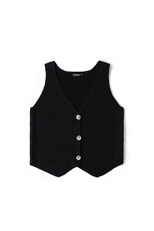черный Трикотажный жилет из хлопка. Модель прямого кроя с V-образным вырезом и застежкой на пуговицы. Дополнить образ можно юбкой в таком же стиле.