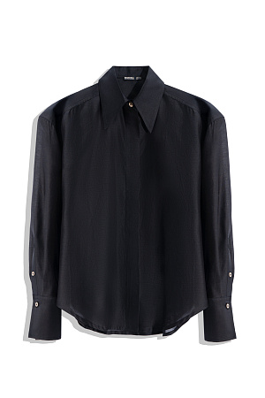 черный Рубашка из шелка с добавлением хлопка. Модель прямого кроя с длинными рукавами с манжетами, классическим отложным воротником, увеличенными плечами и завязкой на спинке. Застежка на пуговицы под планкой.