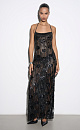 Платье длины макси с геометрическим орнаментом и бахромой, выполненными пайетками. Модель на тонких бретелях, без застежки. Изделие выполнено без подкладки.