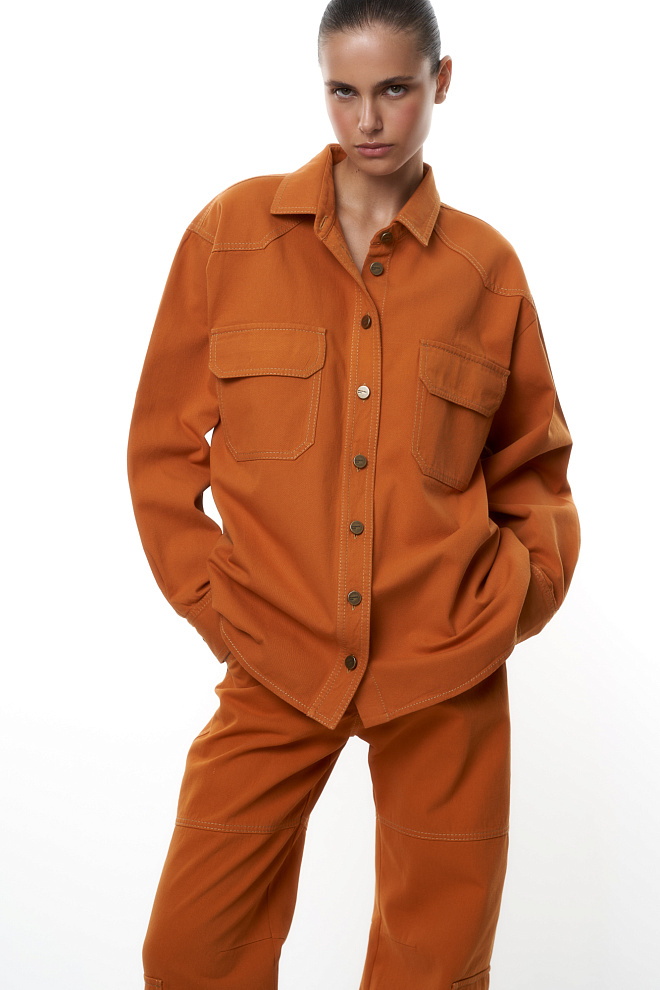 Джинсовая рубашка с застежкой на металлические пуговицы