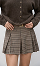 Юбка длины мини в клетку виши из шерсти. Модель прямого кроя, с крупными складками, поясом со шлевками для ремня, врезными карманами спереди и застежкой на молнию. Изделие без подкладки.