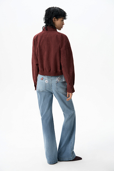 Расклешенные джинсы в стиле гранж