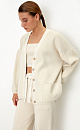 Трикотажный кардиган из хлопка с добавлением вискозы. Модель свободного силуэта, со спущенной линией плеч, V-образным вырезом и накладными караманами. Застежка на пуговицы.
