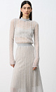 Трикотажное платье длины миди из полупрозрачного кружева с подъюбником из смесовой шерсти. Модель с длинными рукавами, невысоким воротником со сборкой и эластичным поясом. Застежка на пуговицу сзади. Платье выполнено из мягкой пряжи кид мохера и беби альпака, что позволит чувствовать себя в нем комфортно и тепло.