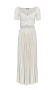 Трикотажное платье длины макси, выполненное из плотной вискозы. Модель с короткими рукавами, юбкой плиссе и вывязанным лифом. 